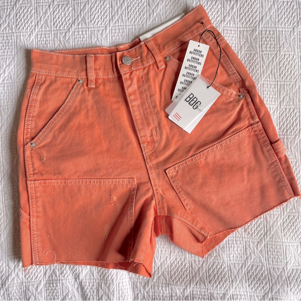 BDG urban outfitters coral / salmon colored cargo shorts in size 26.”